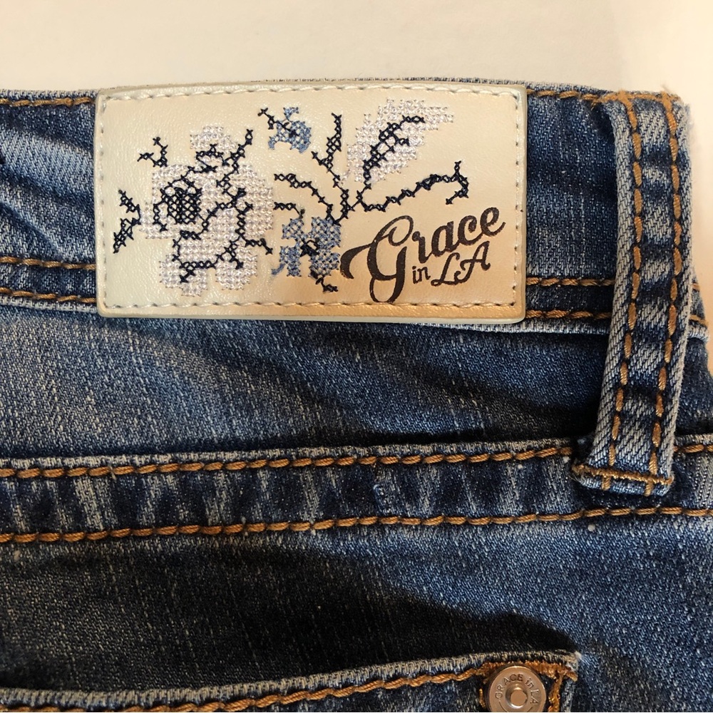 Grace in LA Distressed Floral Embroidered Skinny Jeans (25) - Picture 15 of 16